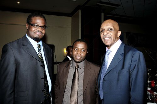 Winston Sill / Freelance Photographer
Gleaner reporters Mark Beckford (left) and Tyrone Reid (centre) who copped awards in investigative and online journalism, lyme with Milton Coleman, president of the Inter American Press Association. They were at The Press Association of Jamaica's National Journalism Awards Banquet on Friday, at the Jamaica Pegasus Hotel.


 night December 2, 2011.