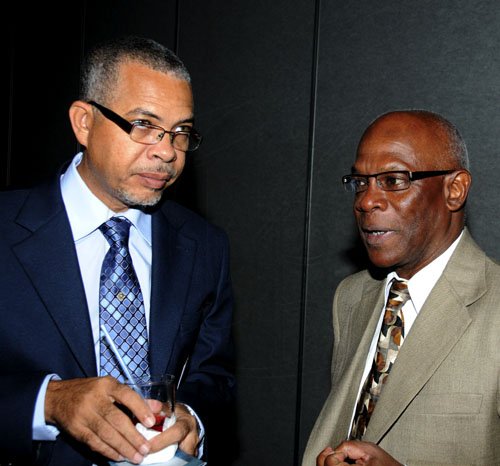 Winston Sill / Freelance Photographer
The Press Association of Jamaica (PAJ) presents the National Journalism Awards Banquet, held at the Jamaica Pegasus Hotel, New Kingston on Friday night December 2, 2011. Here are Earl Maxom (left); and Dr. Canute James (right).