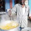 Jermaine Barnaby/Photographer
Brenton Clarke better known as soupy looks after his regular Saturday pot of soup inside the St Ann's Bay Market during a tour of parish capital, St Ann's Bay on Saturday March 21, 2014.