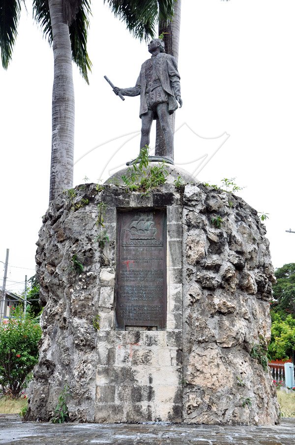 Jermaine Barnaby/Photographer
A monument of Christopher Columbus in a park on Main Street St Ann's bay during tour of parish capital, St Ann's Bay on Saturday March 21, 2014.