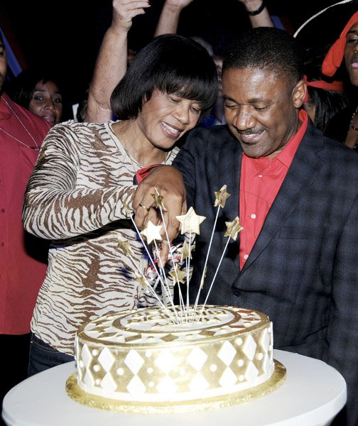 Winston Sill / Freelance Photographer
Minister Phillip Paulwell Birthday Party, held at Fort Charles, Port Royal on Saturday night January 12, 2013. Here Prime Minister Portia Simpson-Miller and Paulwell cuts the birthday cake.