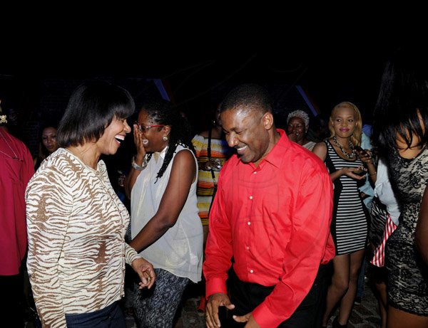 Winston Sill / Freelance Photographer
Minister Phillip Paulwell Birthday Party, held at Fort Charles, Port Royal on Saturday night January 12, 2013. Here are Prime Minister Portia Simpson-Miller (left); Mayor Angela Brown-Burke (centre); and Paulwell (right).