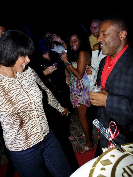 Winston Sill / Freelance Photographer
Minister Phillip Paulwell Birthday Party, held at Fort Charles, Port Royal on Saturday night January 12, 2013. Here Prime Minister Portia Simpson-Miller and Paulwell dancing.