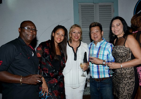Winston Sill/Freelance Photographer
Minister Phillip Paulwell Birthday Party, held at Fort Charles, Port Royal on Saturday night January 11, 2014. Here are Colin Smith (left); Rachel Barrett (second left); Godelieve Van den Bergh (centre), Belgium Ambassador; Brian Chung (second right); and Karlene Smith (right).