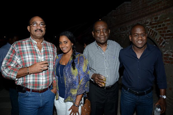 Winston Sill/Freelance Photographer
Minister Phillip Paulwell Birthday Party, held at Fort Charles, Port Royal on Saturday night January 11, 2014. Here are Marshall Peterkin (left); Kimika Peterkin (second left); Derrick Smith (second right); and Duane Smith (right).