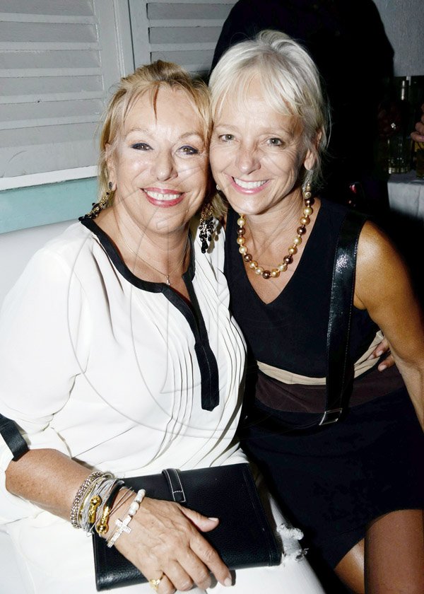 Winston Sill/Freelance Photographer
Minister Phillip Paulwell Birthday Party, held at Fort Charles, Port Royal on Saturday night January 11, 2014. Here are Godelieve  Van den Bergh (left), Belgium Ambassador; and Kelly Tomblin (right).