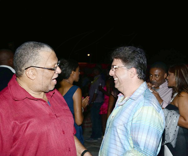 Winston Sill/Freelance Photographer
Minister Phillip Paulwell Birthday Party, held at Fort Charles, Port Royal on Saturday night January 11, 2014. Here are Minister Peter Phillips (left); and Joey Issa (right).