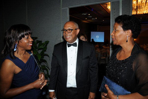 Winston Sill/Freelance Photographer
Association of Consultant Physicians of Jamaica (ACPJ) annual President's Awards Dinner, held at the Jamaica Pegasus Hotel, New Kingston on Saturday night September 14, 2013. Here are Dr. Rosemarie Wright-Pascoe (left), President; Dr. Hopeton Falconer (centre), Awardee; and wife Pat Falconer (right).