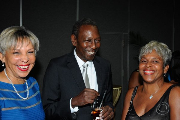 Winston Sill/Freelance Photographer
Association of Consultant Physicians of Jamaica (ACPJ) annual President's Awards Dinner, held at the Jamaica Pegasus Hotel, New Kingston on Saturday night September 14, 2013. Here are Pat Moss-Solomon (left); Justice Dennis Morrison (centre); and  Sharon Barrett (right).