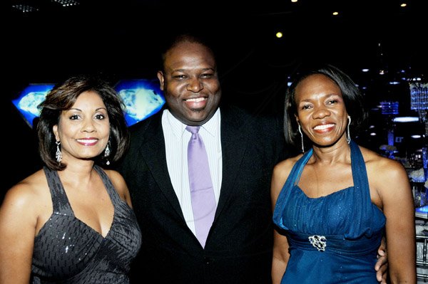 Winston Sill / Freelance Photographer
National Commercial Bank (NCB) the 11th annual Pinnacle Awards Dinner, held at the Jamaica Pegasus Hotel, New Kingston on Saturday night April 6, 2013. Here are Bernadette Barrow (left); Patrick Hylton (centre); and Marcia Reid-Grant (right).
