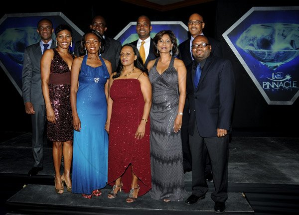 Winston Sill / Freelance Photographer
National Commercial Bank (NCB) the 11th annual Pinnacle Awards Dinner, held at the Jamaica Pegasus Hotel, New Kingston on Saturday night April 6, 2013. Here are executive members: Front row from are Audrey Tugwell Henry; Marcia Reid-Grant; Claudette Rodriques; Bernadette Barrow; and Vernon James. Back row from left are Septimus "Bob" Blake; Patrick Hylton; Steven Gooden; and Dennis Cohen.