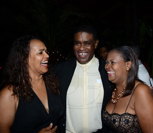 Winston Sill/Freelance Photographer
Portia Simpsom-Miller Foundation hosts its annual Scholarship Fundraising Party, held at Norbrook Drive on Friday night November 15, 2013. Here are Betty Ashley (left); Stve Ashley (centre); and Dollis Campbell (right).