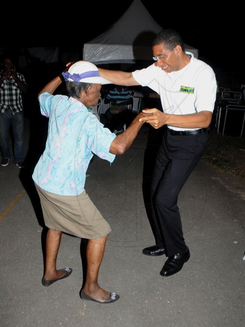 JIS/Photograph                                                                                                                                                                        Pics from PM?s Treats                                                                                                                                                             Prime Minister Andrew Holness takes time out to dance with 88-year-old Anita Jackson, at his treat for elderly residents of his West central St. Andrew constituency at the Olympic Gardens community centre, Olympic Way on Saturday, December 24.