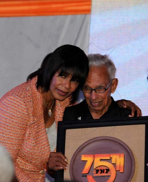Winston Sill/Freelance Photographer
The Peioles National Party (PNP) 75th Anniversary National Gala and Awards Ceremony, held at Caymanas Golf Club, St. Catherine on Tuesday night September 17, 2013. Here are Prime Minister Portia Simpson-Miller (left); and Orville Ramtallie (right).