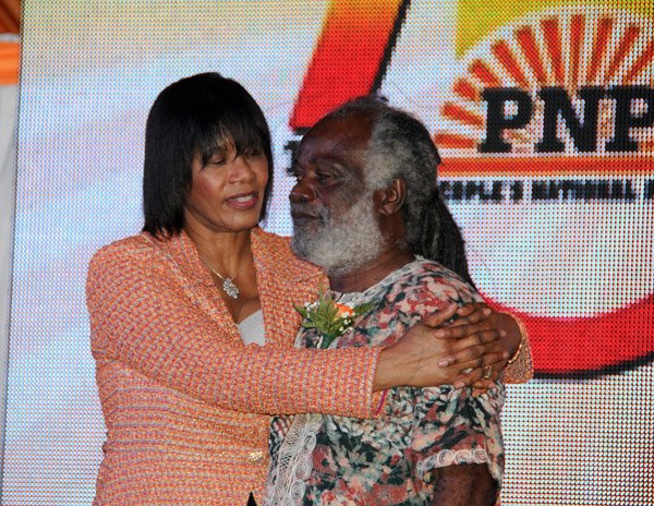 Winston Sill/Freelance Photographer
The Peioles National Party (PNP) 75th Anniversary National Gala and Awards Ceremony, held at Caymanas Golf Club, St. Catherine on Tuesday night September 17, 2013. Here are Prime Minister Portia Simpson-Miller (left) and Owen Dave Allen (right).
