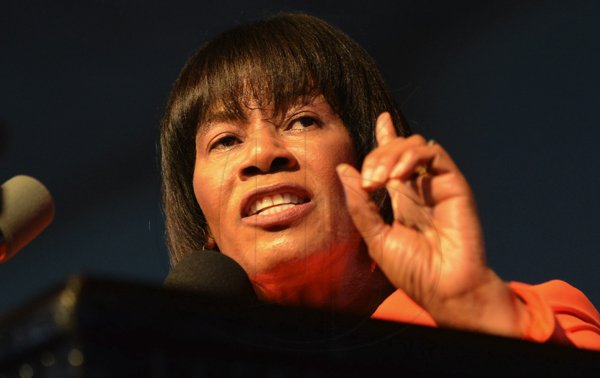 Rudolph Brown/Photographer
Prime Minister Portia Simpson Miller speaks at the PNP's 74th Annual Conference 2012 at National Arena in Kingston on Sunday, September 16-2012