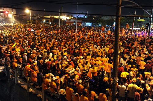 Norman Grindley/Chief Photographer
Thousands of People National Party supporters gather in Cross roads St. Andrew last night to hear party leader Portia Simpson-Miller as she addresses them.