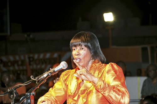 Norman Grindley/Chief Photographer
People's National Party President Portia Simpson Miller addresses her party's mass rally in Cross Roads, St Andrew Saturday night.