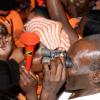 Jermaine Barnaby/Photographer
An attendee tries to get a closer view of the action onstage at the PNP rally in Black River, St. Elizabeth on Sunday November 22, 2015.
