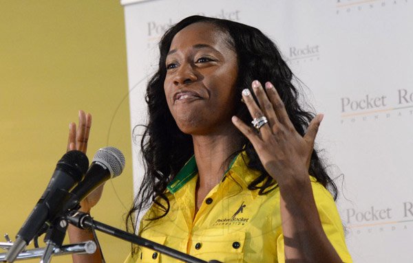 Rudolph Brown/Photographer
Double Olympic Sprint Champion Shelly-Ann Fraser Pryce,  Chairperson of the Pocket Rocket Foundationspeaks at the Pocket Rocket Foundation scholarship to them at the presentation ceremony at Devon House on Tuesday, September 17, 2013