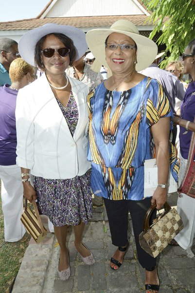 Rudolph Brown/Photographer
Ambassador Pamela Bridgewater, (left) pose with Sandra scott at Scotia Private Client Group Jamaica Open Polo tournament at Caymanas Estate on Sunday, March 10-2013.