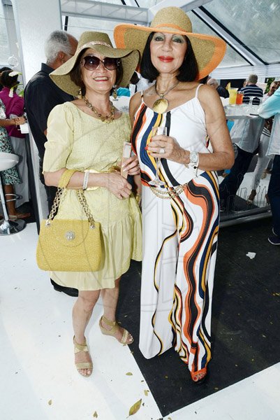 Rudolph Brown/Photographer
Thalia Lyn, CEO of Island Grill and  Michelle Bovell at Scotia Private Client Group Jamaica Open Polo tournament at Caymanas Estate on Sunday, March 10-2013.