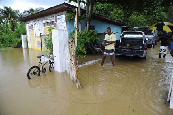 Ricardo Makyn/Staff Photographer
 Flooding in the  Rosen Community St Mary