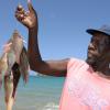 Gladstone Taylor / Photographer

Fisherman Calvin Skinner shows his freshly caught fish

Parish capital feature on Port Maria.