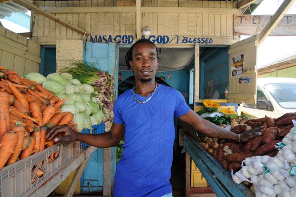 Gladstone Taylor / Photographer

Marvin Bailey a vegetable vendor in port maria, owns a shop along the portmaria main road, has operated there for over 9 years.

Parish capital feature on Port Maria.