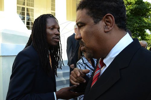 Rudolph Brown/Photographer
Governor General Sir Patrick Allen swearing the Portia Simpson Miller cabinet ministers at Kingston House on Friday, January 6-2012