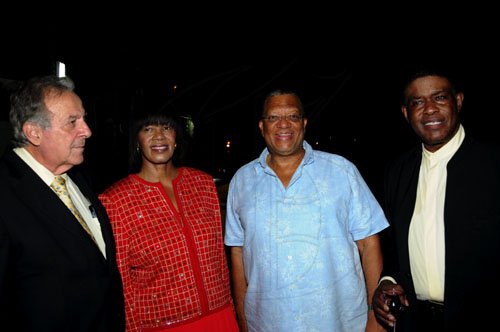 Winston Sill / Freelance Photographer
Portia Simpson-Miller Foundation annual fundraising party, held at Norbrook Drive, St. Andrew on Friday night November 18, 2011. Here are Abe Dabdoub (left); Portia Simpson-Miller (second left); Dr. Peter Phillips (second right); and Steve Ashley (right).