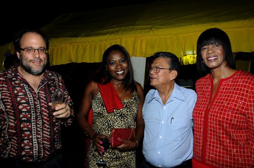 Winston Sill / Freelance Photographer
Portia Simpson-Miller Foundation annual fundraising party, held at Norbrook Drive, St. Andrew on Friday night November 18, 2011. Here are Mark Golding (left); Mrs.---?? Golding (second left); Lascelles Chin (second right); and Portia Simpson-Miller (right).