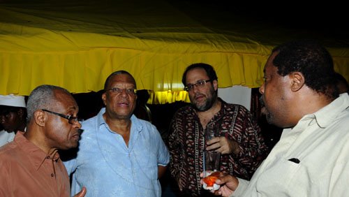 Winston Sill / Freelance Photographer
Portia Simpson-Miller Foundation annual fundraising party, held at Norbrook Drive, St. Andrew on Friday night November 18, 2011. Here are Jack Shirley (left); Dr. Peter Phillips (second left); Mark Golding (second right); and Lambert Brown (right).
