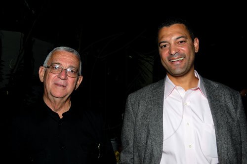 Winston Sill / Freelance Photographer
Portia Simpson-Miller Foundation annual fundraising party, held at Norbrook Drive, St. Andrew on Friday night November 18, 2011. Here are Deacon Ronald Thwaites (left) and his son.