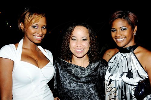 Winston Sill / Freelance Photographer
Young belles (from left) Toni Oliver, Leah Lue-Tenn and Courtnie Watson are having a good time at the Portia Simpson Miller Foundation annual fund-raising party, held at Norbrook Drive, on Friday night.




 November 18, 2011. .