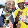 Rudolph Brown/Photographer
Malik Martin, (left) 1st place winner of Royal Maroon and 2nd runner up David Graham pose with winning trophy at the Best Dressed Chicken Portland Jerk Festival at Folly Ruins in Portland on Sunday, July 7, 2013