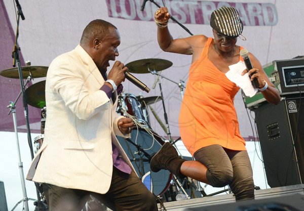 Rudolph Brown/Photographer
 Jennifer "Jenni Jenni" Small dance while Lubert Levy sing at the Best Dressed Chicken Portland Jerk Festival at Folly Ruins in Portland on Sunday, July 7, 2013
