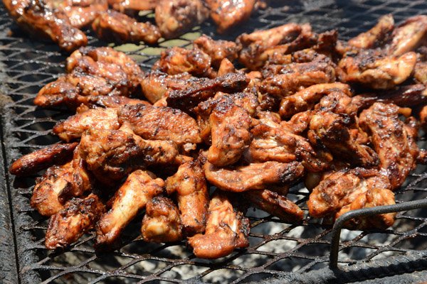 Rudolph Brown/Photographer
Jerk chicken wings at the Best Dressed Chicken Portland Jerk Festival at Folly Ruins in Portland on Sunday, July 7, 2013