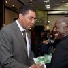 Jermaine Barnaby/Photographer
Opposition Leader Andrew Holness (left) greeting Pastor Glen O. Samuels president West Jamaica Conference of Seventh Day Adventists at the annual National Leadership Prayer Breakfast at the  Jamaica Pegasus Hotel in New Kingston on Thursday, January 21, 2016.