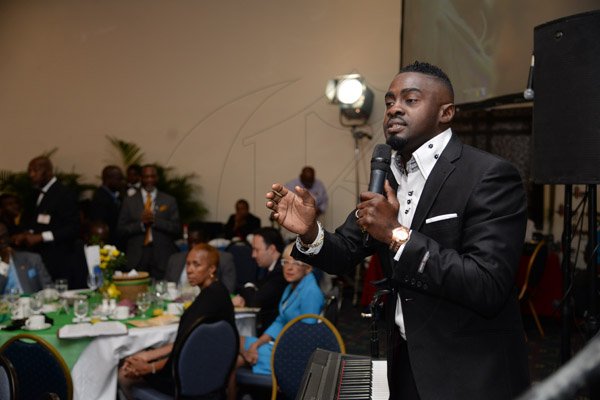 Jermaine Barnaby/Photographer
Jermaine Edwards singing at the annual National Leadership Prayer Breakfast at the  Jamaica Pegasus Hotel in New Kingston on Thursday, January 21, 2016.