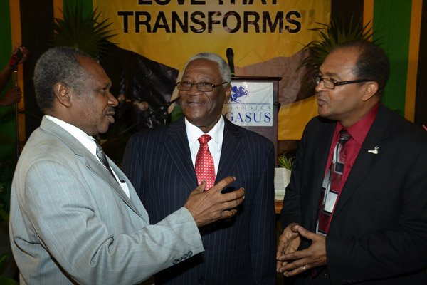 Ian Allen/Photographer
everend Dr.Peter Garth right, Chairman, National Leadership Prayer Breakfast Committee talks with Dr.Maitland Evans centre, President, International University of the Caribbean and Errol Rattray left, Executive Member of Hands Across Jamaica after the conclussion of the 33rd National Leadership Prayer Breakfast under the theme:"Love That Transform". The Prayer Beakfast was held at the Jamaica Pegasus Hotel in Kingston on Thursday.