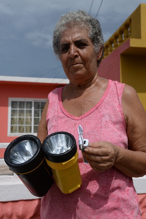 Jermaine Barnaby/Freelance PhotographerMarion Murray went out and purchased flash lights and battery charger in preparation for  hurricane Matthew on Saturday October 1, 2016.