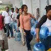 Rudolph Brown/PhotographerResidence in line waiting to refill they water bottle at the Blake's Water Store in Liguanea in preparation for Hurricane Matthew on Saturday, October 1, 2016