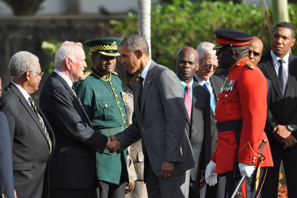 Jermaine Barnaby/Photographer
US President Barrack Obama (right) meets with major general Robert Neish just befre he laid a wreath at National Heroes Park on Thursday April 9, 2015.