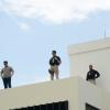 Rudolph Brown/Photographer
Security personnel on the roof of Jamaican House before President Barack Obama arrival at Jamaica House, in Kingston, Jamaica on Thursday, April 9, 2015,