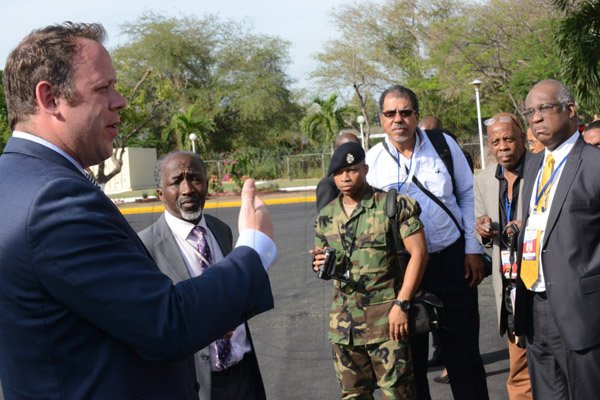 Rudolph Brown/Photographer
Security personnel brief the media at Jamaican House before President Barack Obama arrival at Jamaica House, in Kingston, Jamaica on Thursday, April 9, 2015,