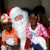 Winston Sill / Freelance Photographer
Prime Minister Andrew Holness and wife Juliet host Children Christmas Treat, held at Vale Royal, St. Andrew on Wednesday December 14, 2011.  Here are Sabjie Reynolds (left); and Antoinette DuCasse (right) with Santa.