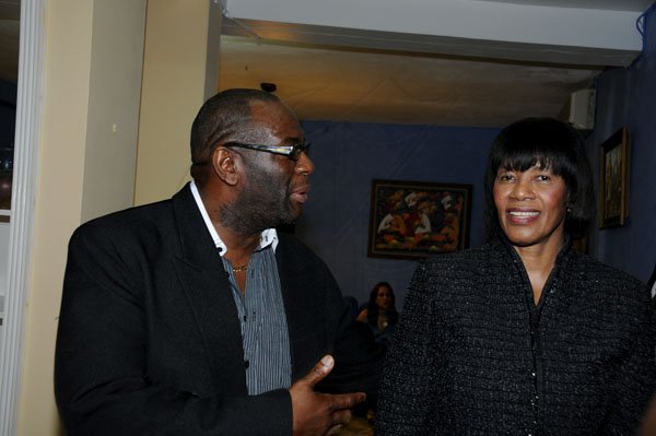 Winston Sill / Freelance Photographer
The Portia Simpson-Miller Foundation annual Scholarship Award Fundraising Party, held at Norbrook Drive, on Friday night November 16, 2012. Here are Dwight Moore (left); and Prime Minister Simpson-Miller (right).