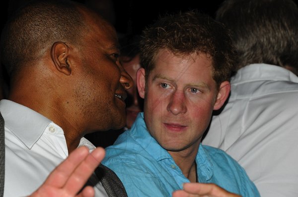 Publicatin The Gleaner/Something Extra
Sheena Gayle photo

Ministry of National Security Peter Bunting whispers something to His Royal Highness Prince Harry at a Jamaica Night reception at Sandals Cay in Montego Bay