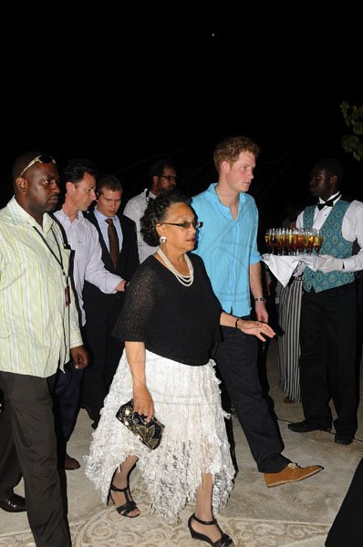 Prince Harry makes his way on to the Sandals Cay island to participate in the Jamaica Night activities held in his honour in Montego Bay on Wednesday night